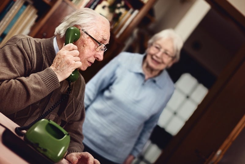 Senior couple at the telephone